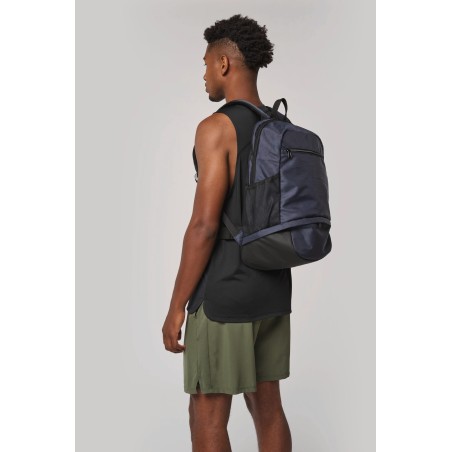 Backpack with ball compartment