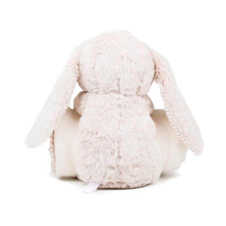 Conejo de peluche y manta
